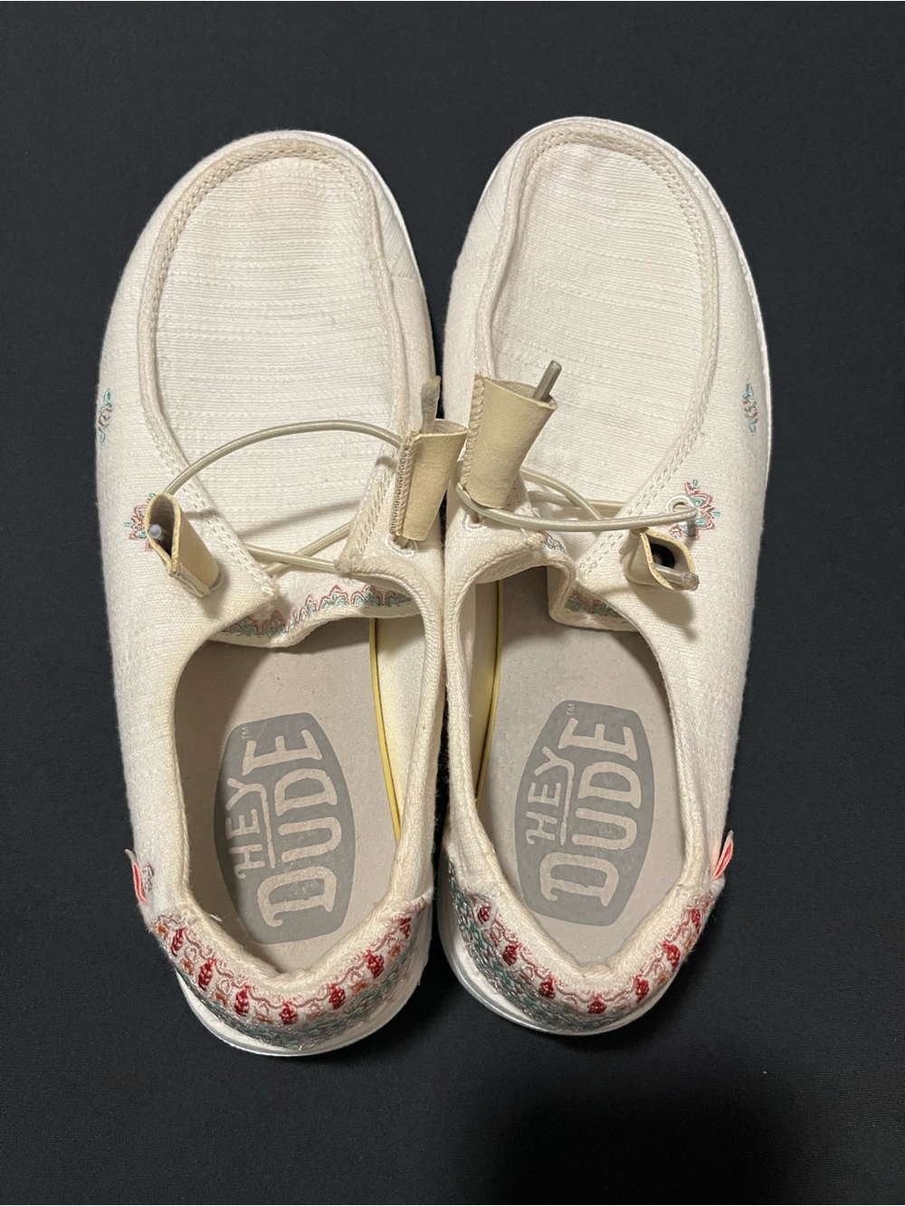 Hey Dude White/Cream Slip-On Shoes with Embroidered Accents